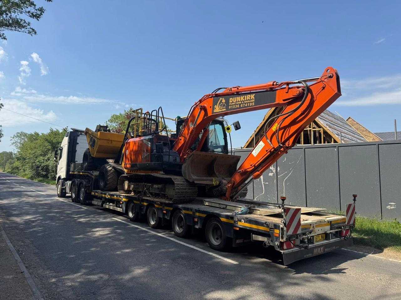 Dunkirk excavator loaded for nationwide plant hire delivery